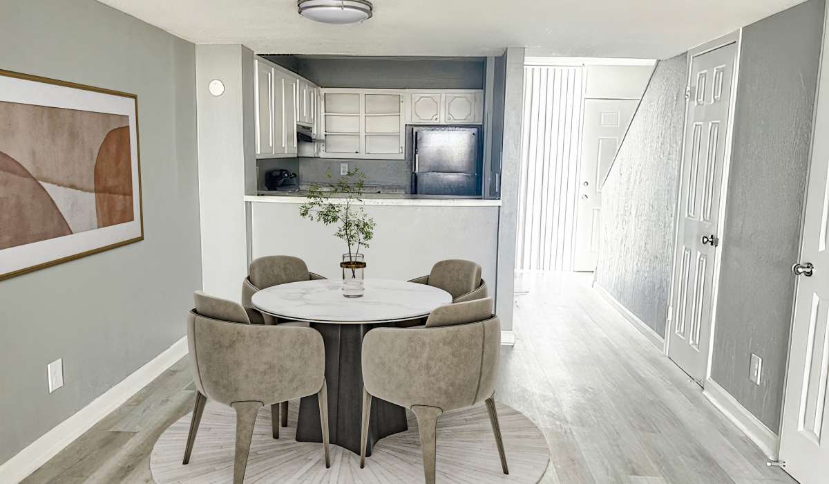 Dining room with a round table at Cliffside at Mountain Park in El Paso, Texas